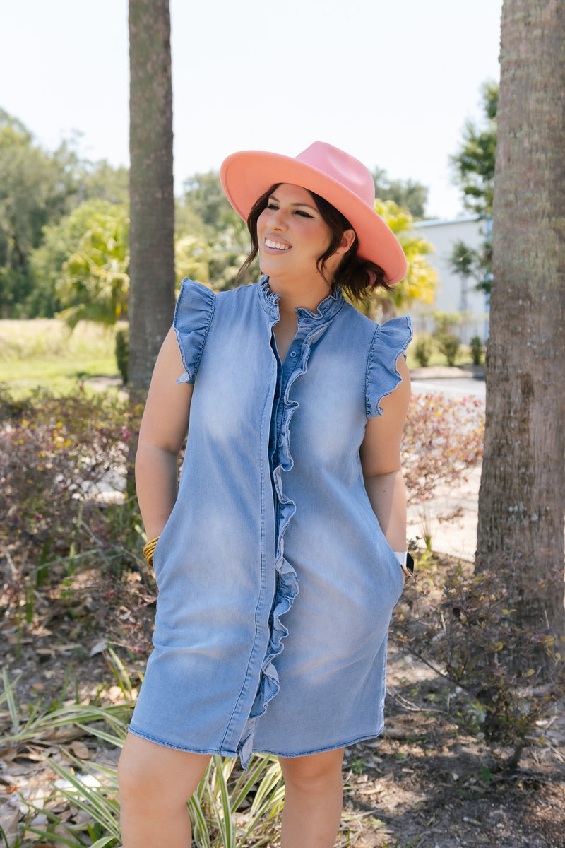 Woman within denim outlet dress