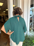 A TWIST ON CLASS TOP