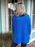 KNITTED IN PERFECTION COWL NECK SWEATER