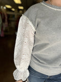 FLIRTY PERSPECTIVE EYELET SLEEVE TOP