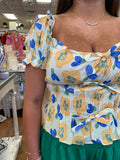 THE SANIBEL FLORAL PEPLUM TOP