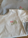 GOD’S GOT MY BACK TRACTOR COMFORT COLOR & BELLA CANVAS TODDLER TEE