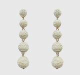 BLISSFUL DAYS LINEAR RAFFIA BALL EARRINGS
